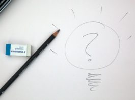 drawn light bulb and a pencil