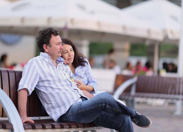 Couple sitting on a bench